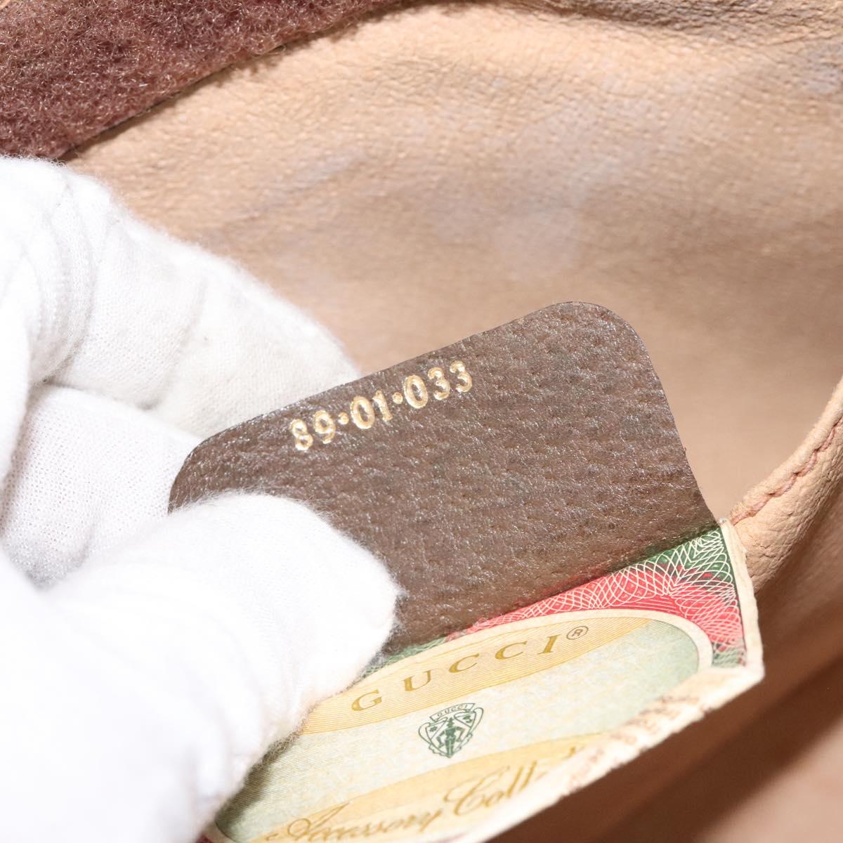 Gucci Monogram Clutch