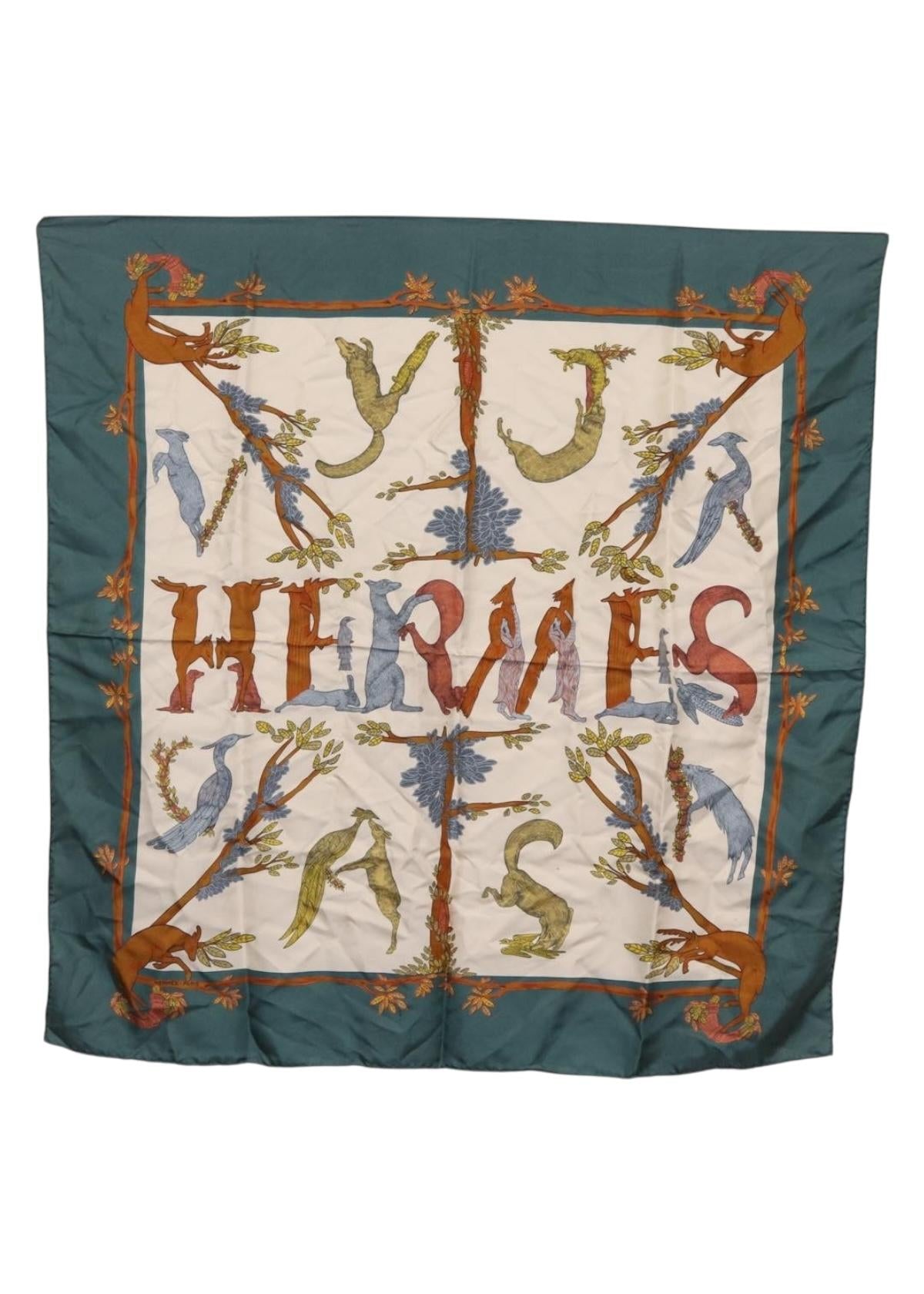 Hermès Green Spell Out Silk Scarf front