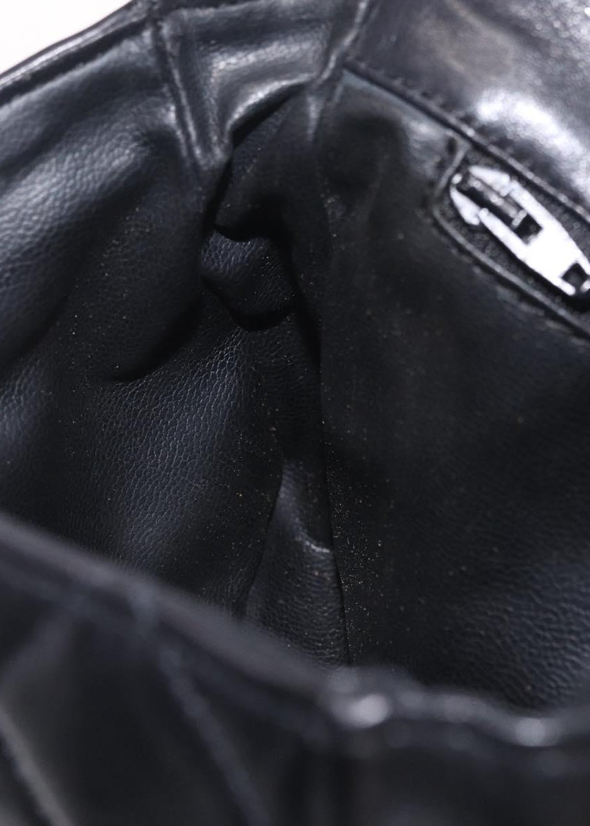 Chanel Black and Gold Quilted Belt Bag interior