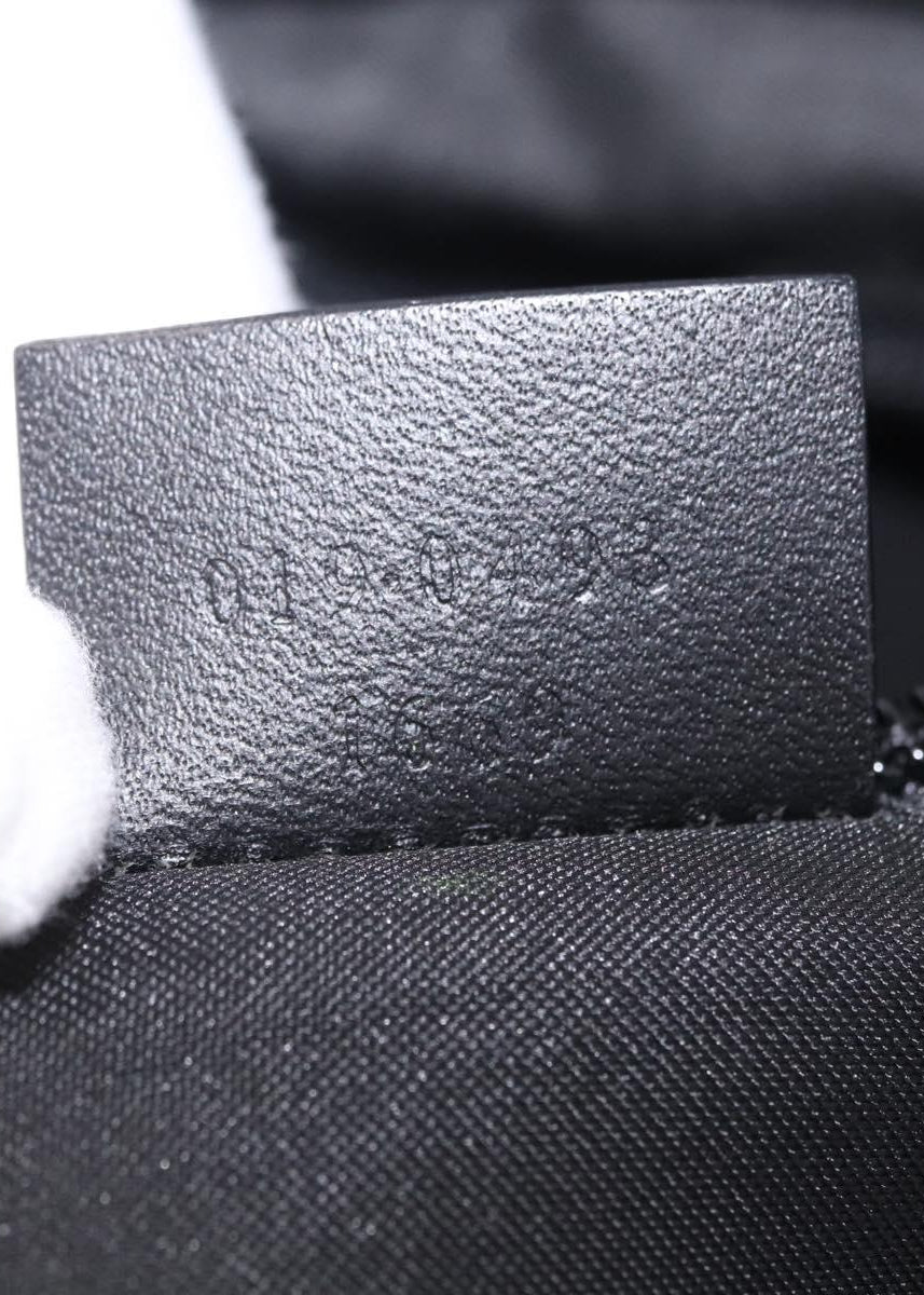 Gucci Black Monogram Tote serial tag