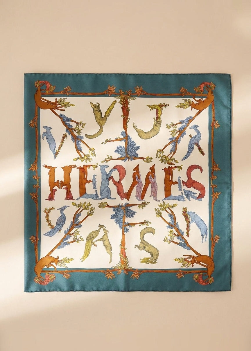 Hermès Green Spell Out Silk Scarf cover