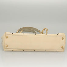 Load image into Gallery viewer, Chanel Cream Preforated Tote
