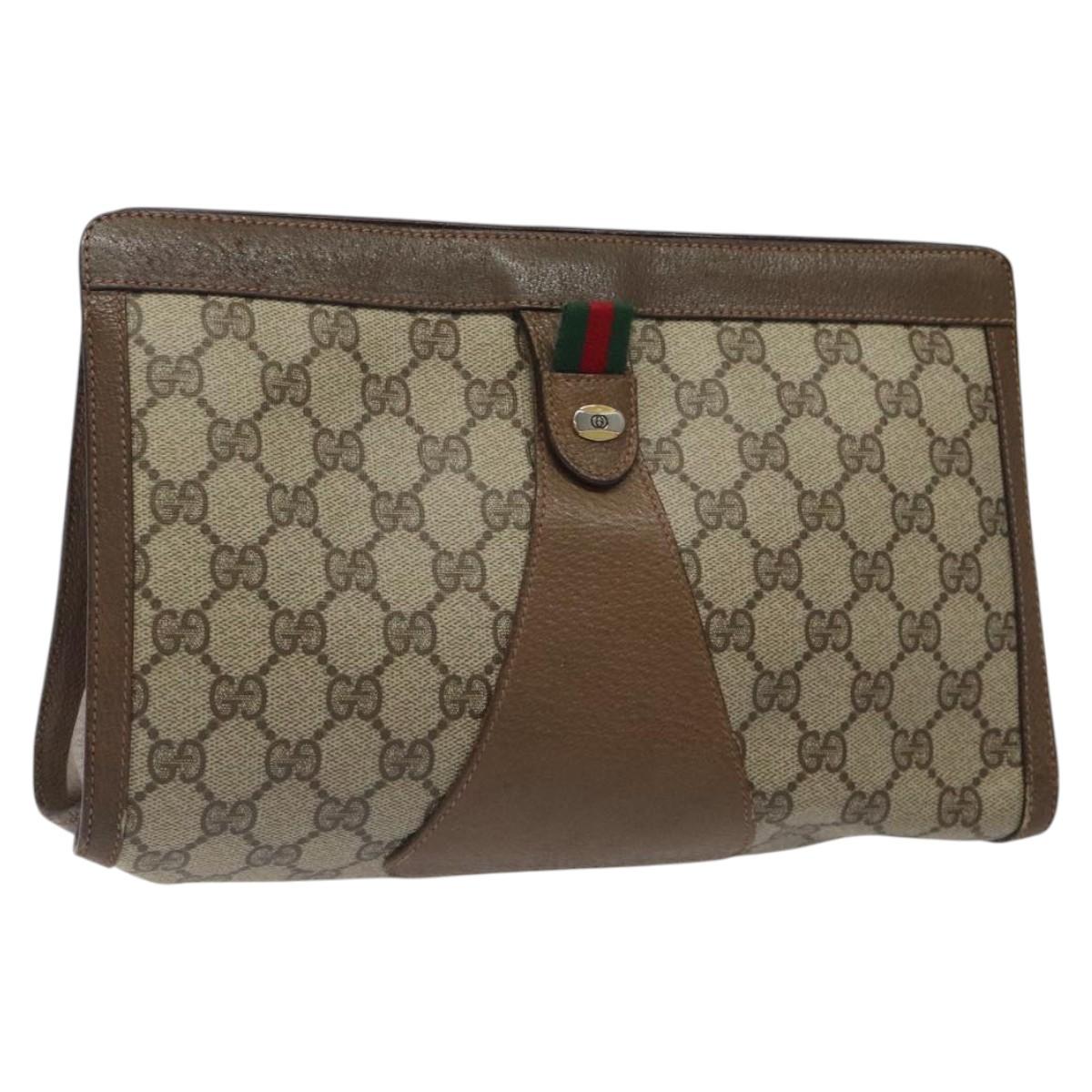 Gucci Monogram Clutch