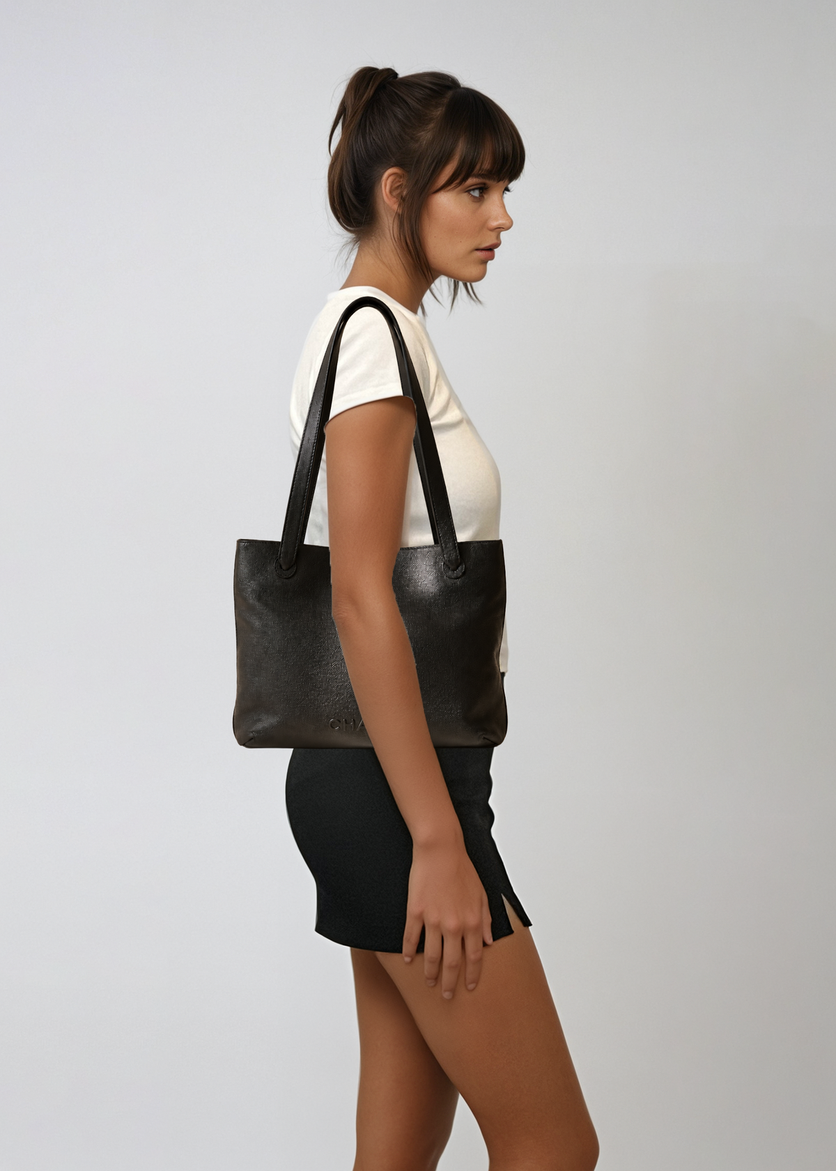 Chanel Black Leather Embossed Tote