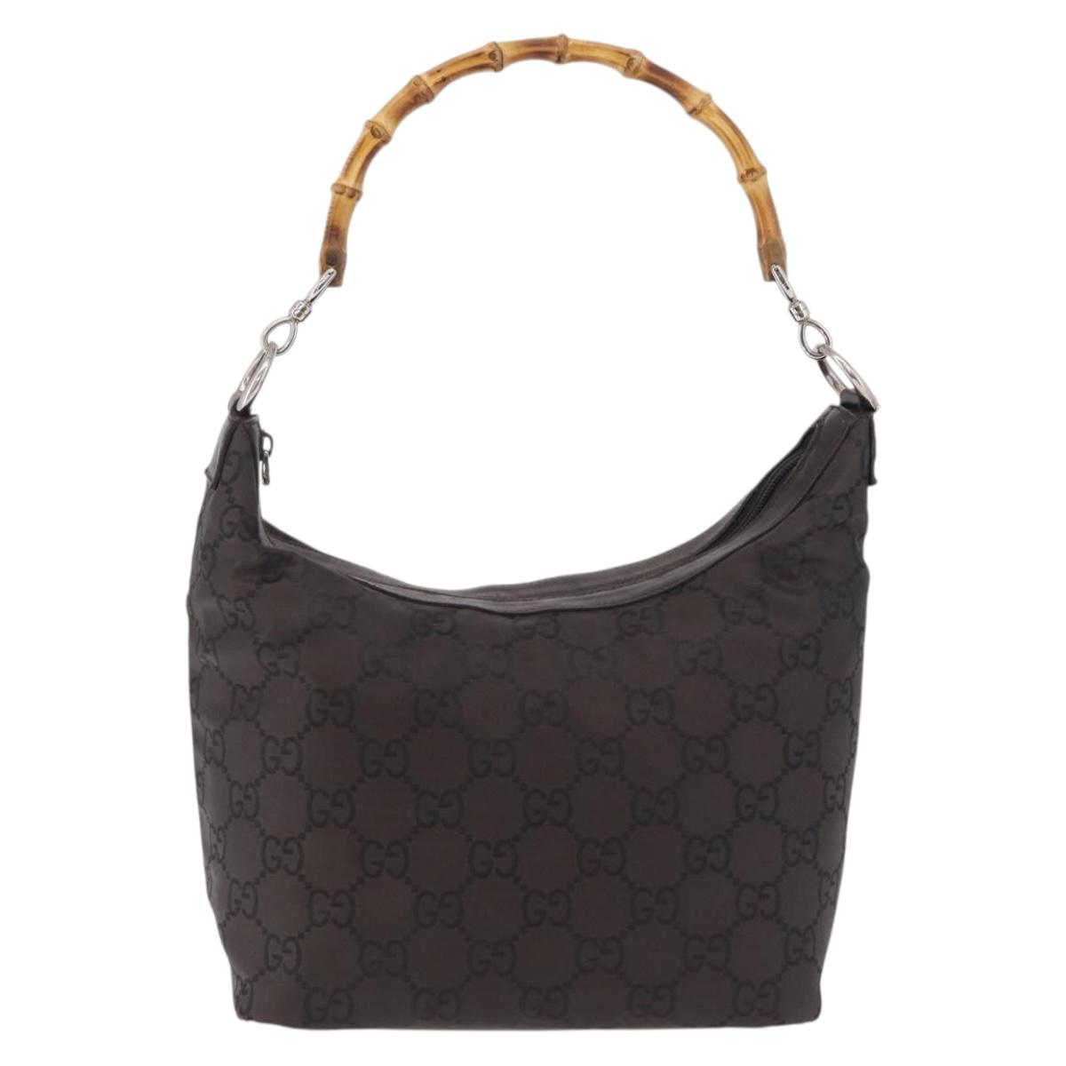 Gucci Monogram and Bamboo Handbag