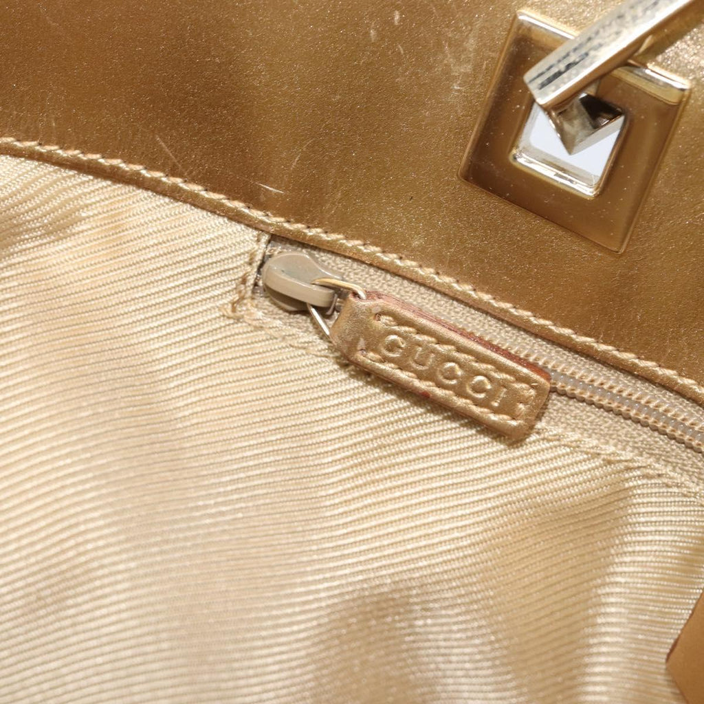 Gucci Gold Monogram Tote