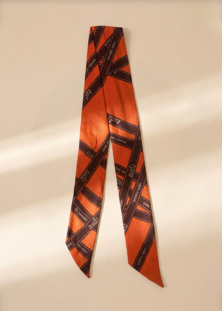 Hermès Orange Twilly Scarf cover
