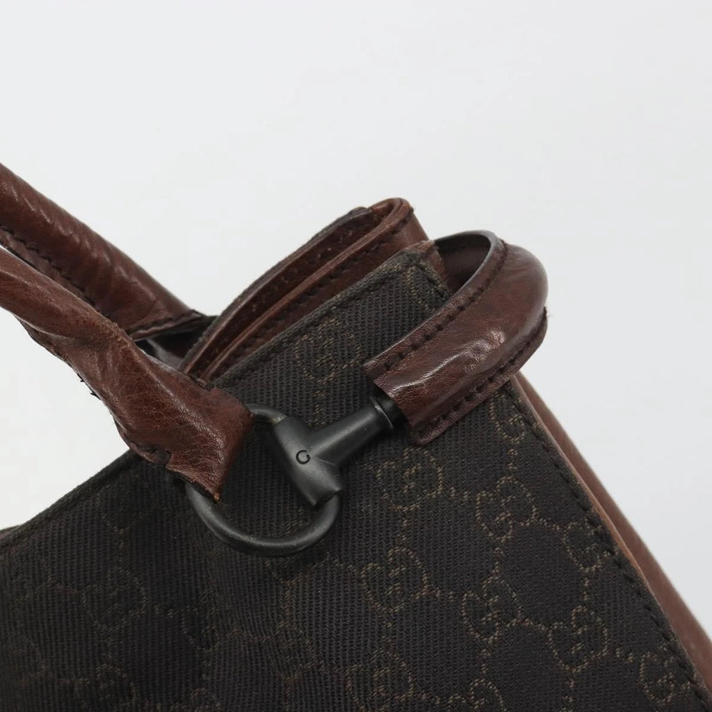 Gucci Monogram Leather Trimmed Shoulder Bag