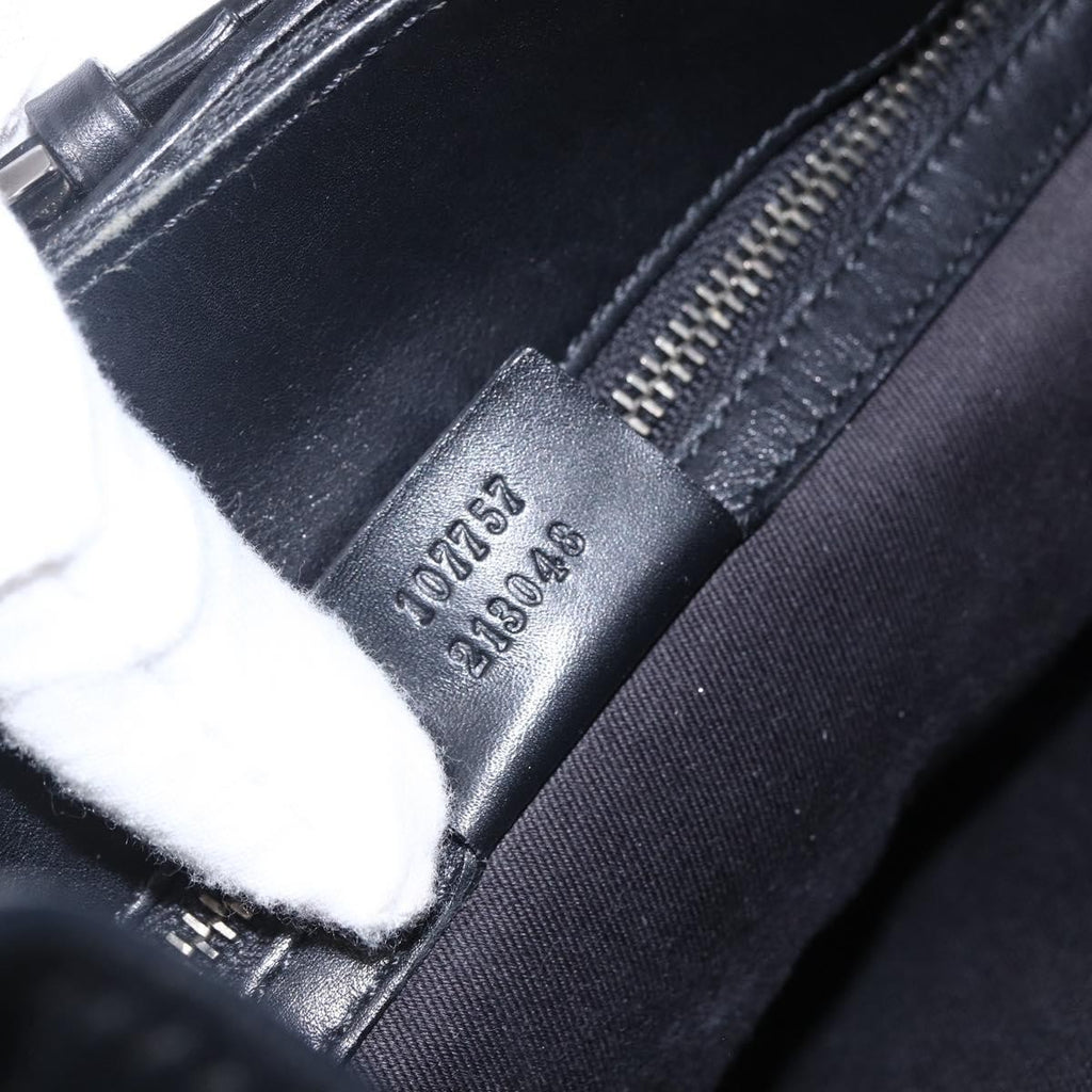 Gucci Black GG Canvas Tote serial code tag