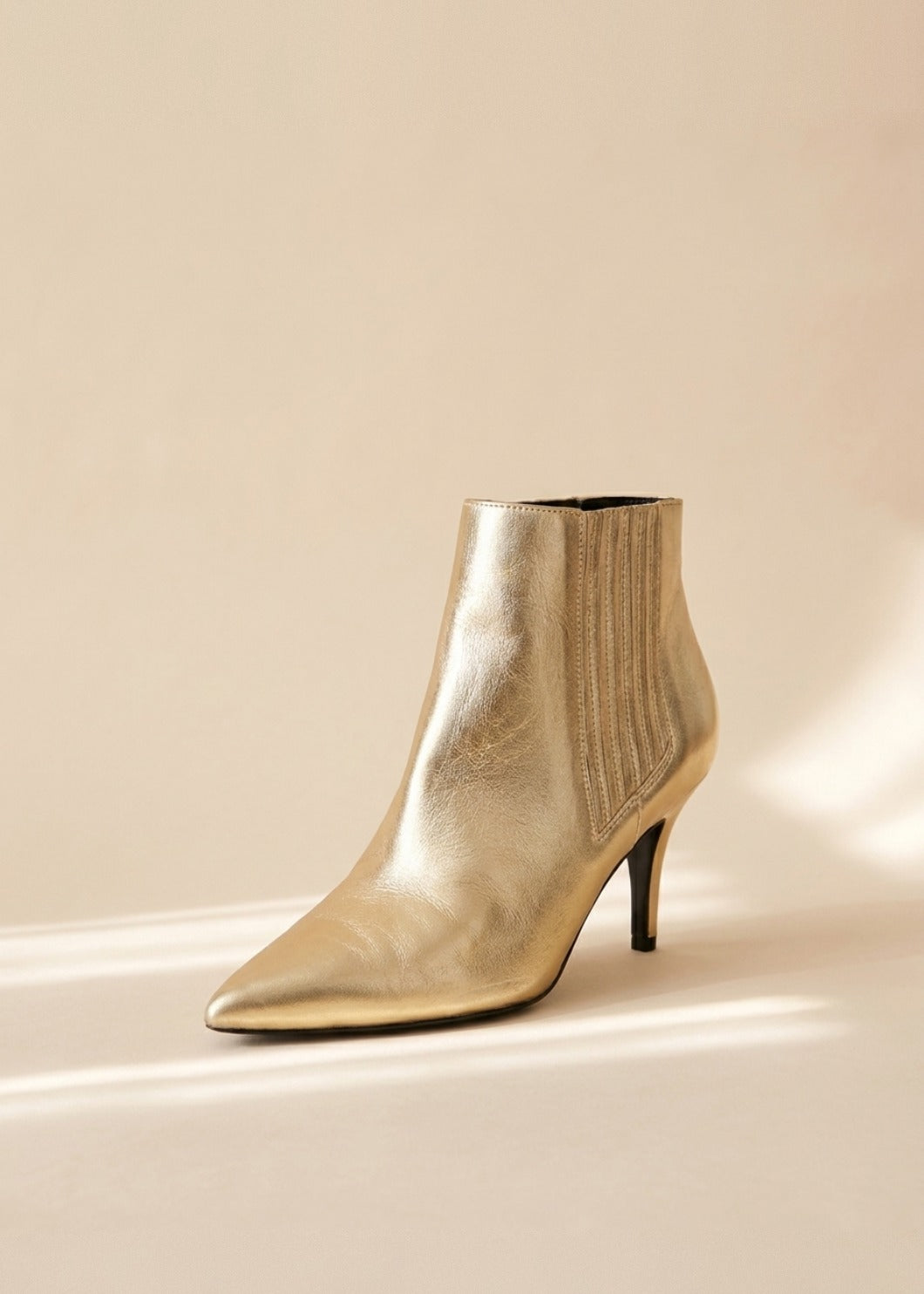 Celine Gold Booties cover